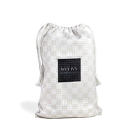beach towel and bag - towel with bag - microfiber beach towel - travel towel - compact towel - lightweight beach towel - nice beach towels - fast drying towels for camping - checkered bath towels - checkered towels - striped towels - quick drying bath towels - sand resistant towels - sand free beach towels