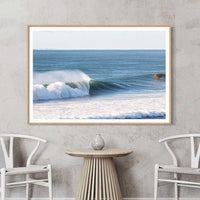 Oak framing suits the warm tones of this Sunshine Coast barrel shot, surf wall art with a natural finish