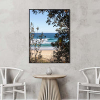 Black floating frame canvas, bold Australian beach wall art of the Ulladulla coastline framed by banksia foliage
