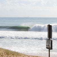 Wurtulla Beach surf photography, Sunshine Coast coastal wall art featuring a clean wave breaking along the beach