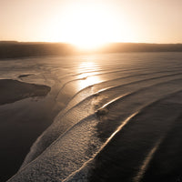 Perfect swell lines wrap around Double Island Point, one of Australia's most famous right hand breaks, shot at Rainbow Beach