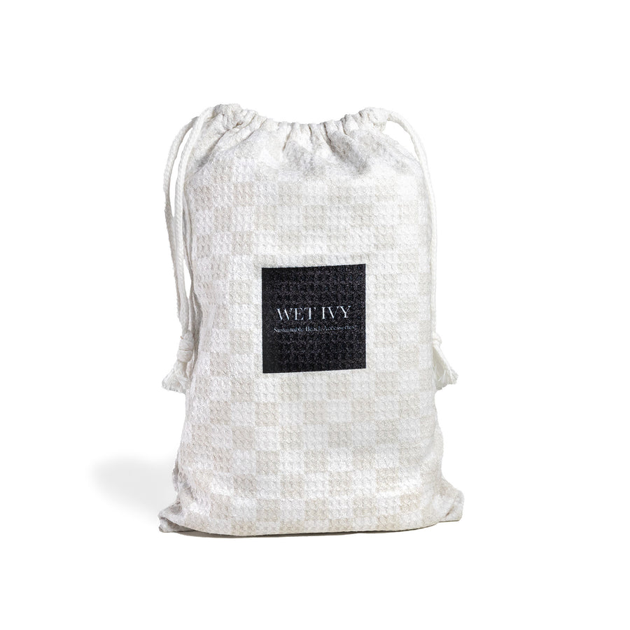 beach towel and bag - towel with bag - microfiber beach towel - travel towel - compact towel - lightweight beach towel - nice beach towels - fast drying towels for camping - checkered bath towels - checkered towels - striped towels - quick drying bath towels - sand resistant towels - sand free beach towels 