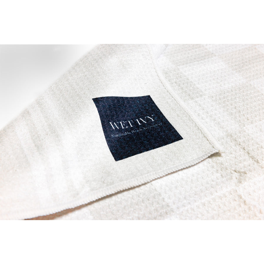 sand free beach towel - best pool towels -  sustainable beach towels - towels that dry fast - bachelorette beach towels - quick dry towels for dorms - pure soft quick dry towels - beach towel on beach 