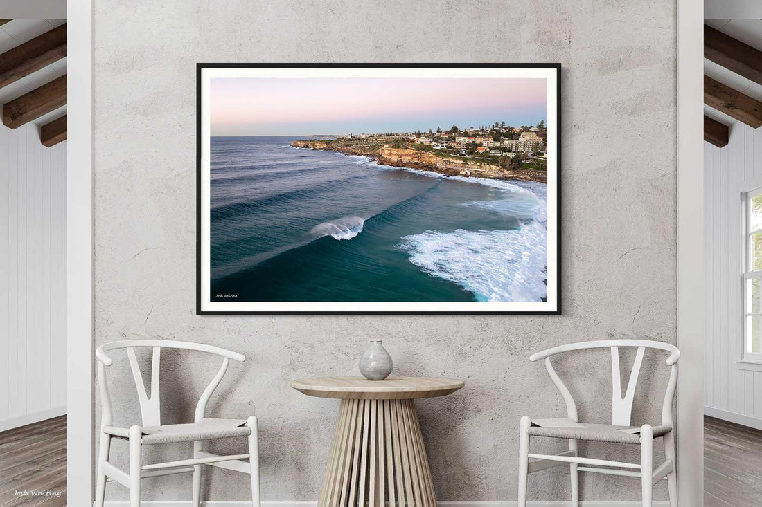 Black framed wall art print, warm toned sunrise photography of Bronte Beach