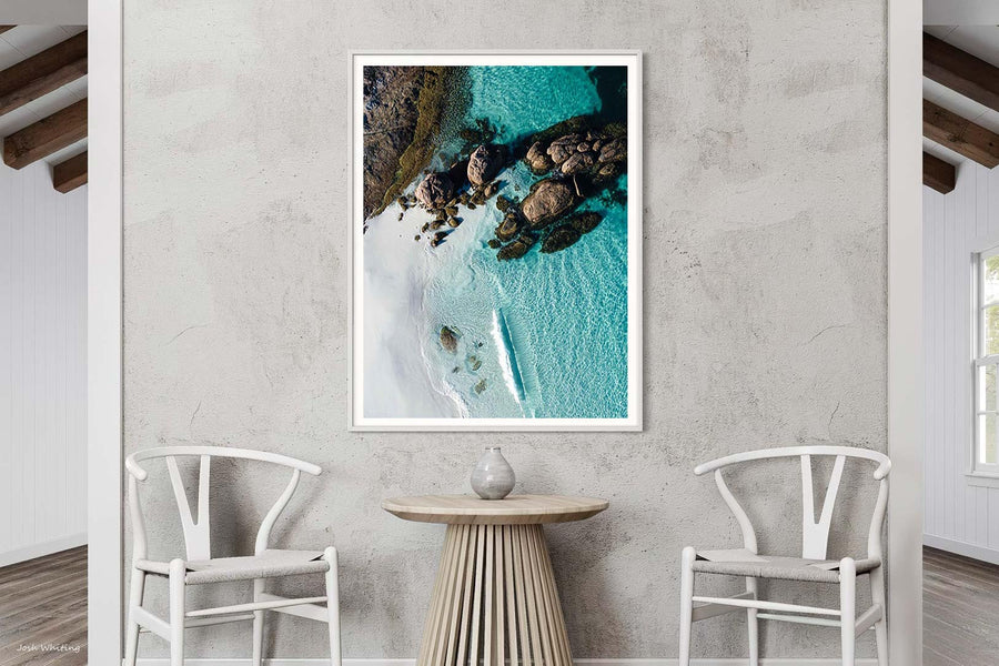 White framed beach photography print of Little Hellfire Bay's turquoise water, framed by granite boulders, Western Australia coastal wall art [[framed_white]]