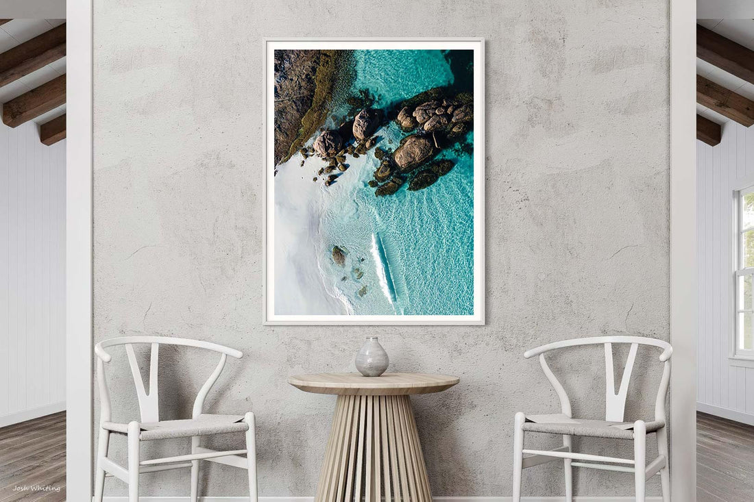 White framed beach photography print of Little Hellfire Bay's turquoise water, framed by granite boulders, Western Australia coastal wall art