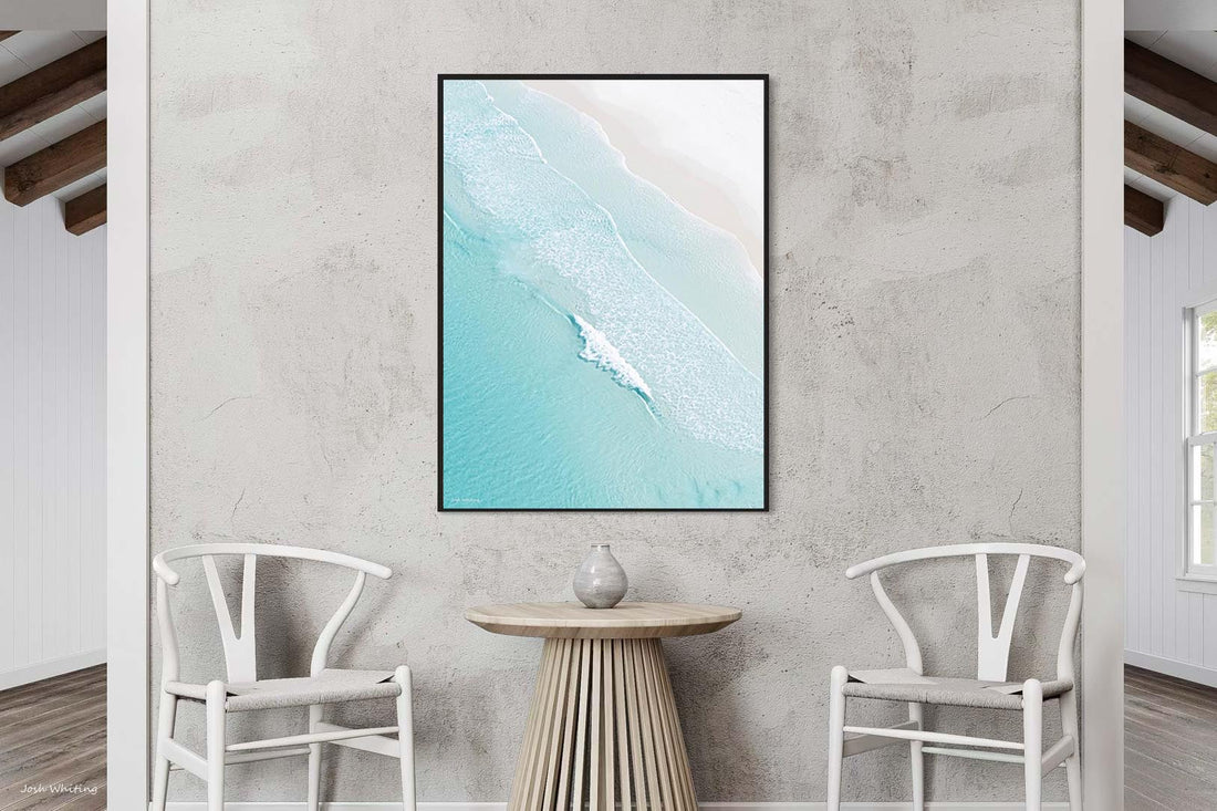 Black floating frame canvas featuring the aerial coastline of Open Coast, Scandinavian coastal wall art with a bold edge