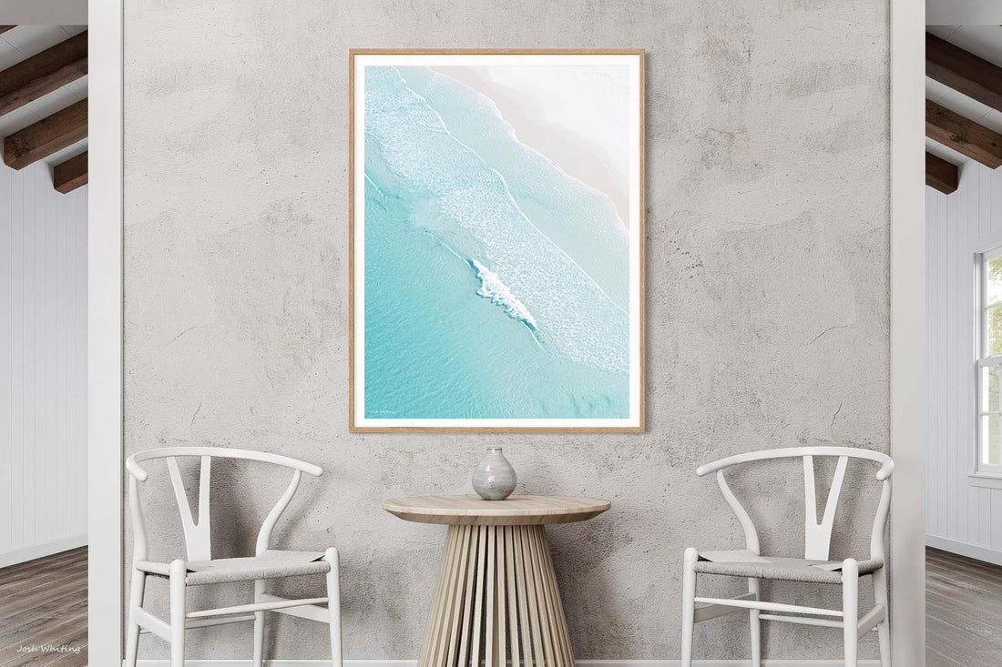 Oak framed aerial coastline print, warm tones for Australian coastal wall art