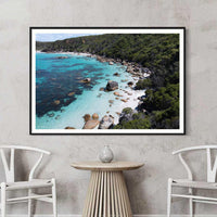 Black framed landscape print, high-contrast Australian wall art of rock pools from above