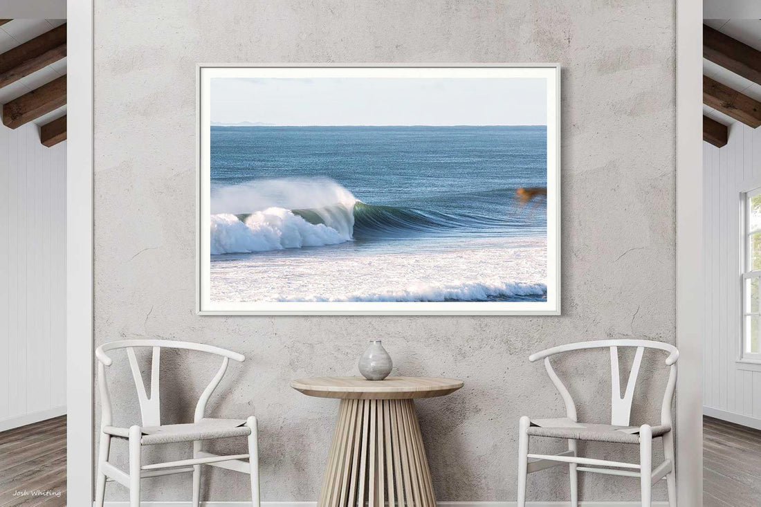 This left hand point break print hangs framed in white, Sunshine Coast surf photography for a coastal wall