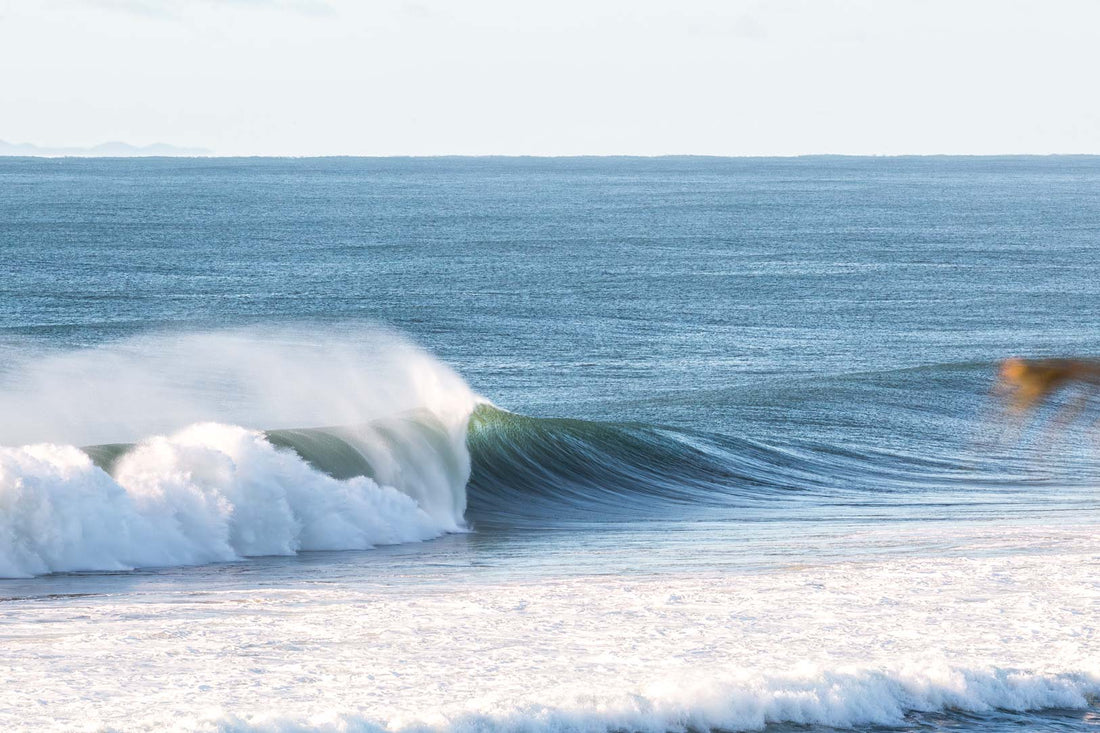 A powerful swell wraps into a barrel at this Sunshine Coast point break, Australian surf photography print