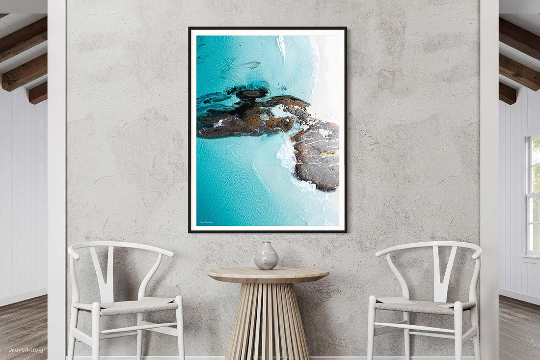 Black framed abstract print, high-contrast Australian wall art of turquoise water and colour