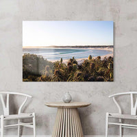 Frameless acrylic print of Wharton Beach, glossy finish that lifts the turquoise water and wave texture